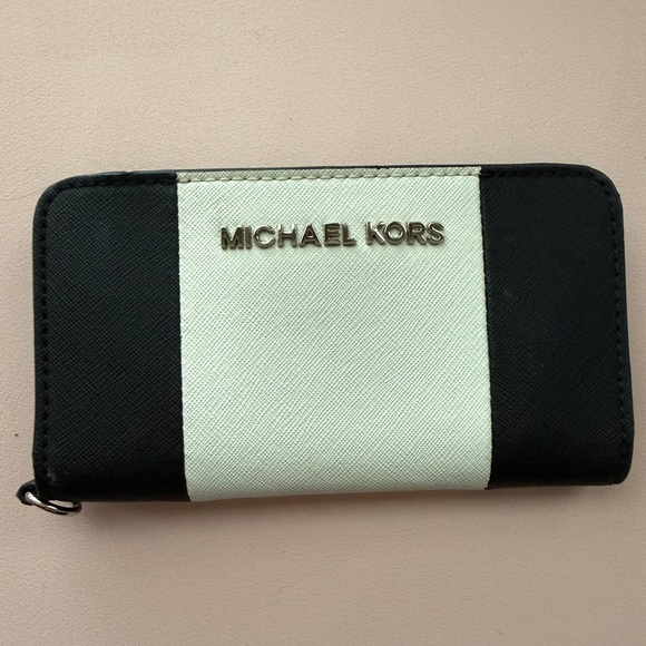 Michael Kors Handbags - Michael Kors Black and White Striped Zip Around Wallet